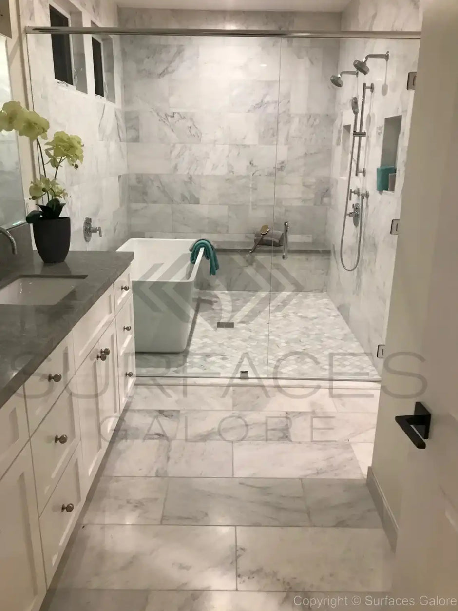 Installed marble and travertine tiles in various spaces like kitchen, bathroom, and living room, showcasing elegant and durable natural stone surfaces