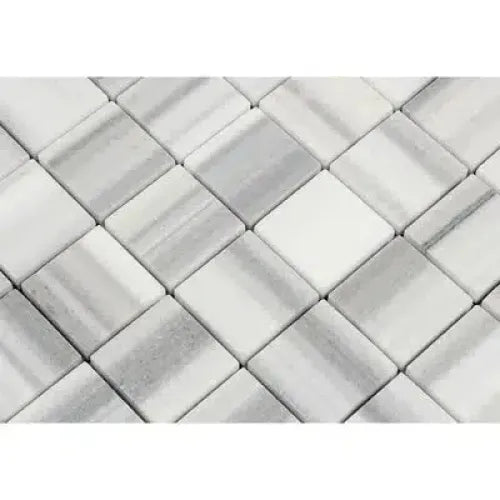 Gray and white marble tile pattern in Mink Equator Zebra Marble 2X2 Mosaic Tile Polished