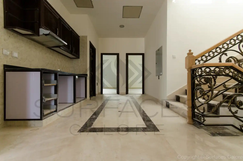 Installed marble and travertine tiles in various spaces like kitchen, bathroom, and living room, showcasing elegant and durable natural stone surfaces