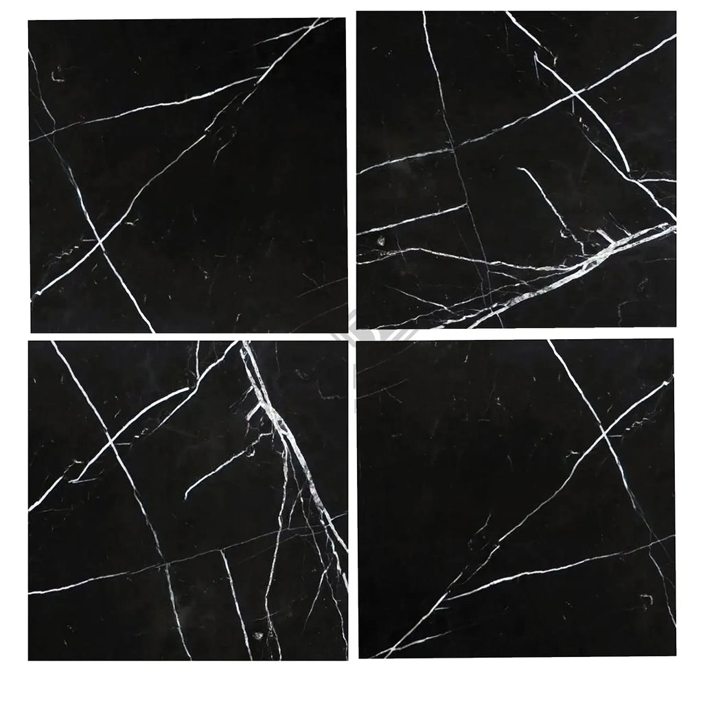 Four black marble tiles featuring white veining in Nero Marquina 18X18 polished or honed