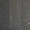 Dark marble tiles with white veining from Nero Marquina Black Marble 4X12 collection