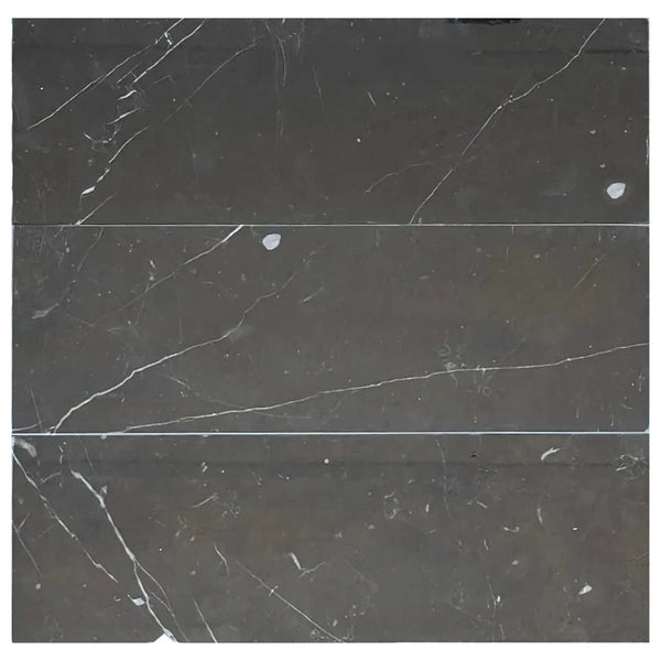 Gray marble tiles with white veining in Nero Marquina Black Marble 4X12 finish