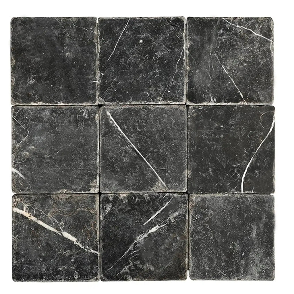 Nine square black marble tiles from Nero Marquina Black Marble 4X4 Tumbled collection