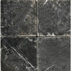 Four dark marble tiles of Nero Marquina Black Marble 6X6 Tumbled display