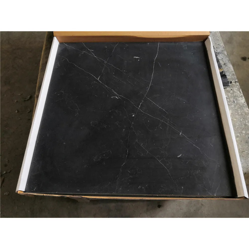 Black marble tile with white veining in Nero Marquina Black Pinwheel Mini mosaic