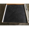 Black marble tile with white veining in Nero Marquina Black Pinwheel Mini mosaic