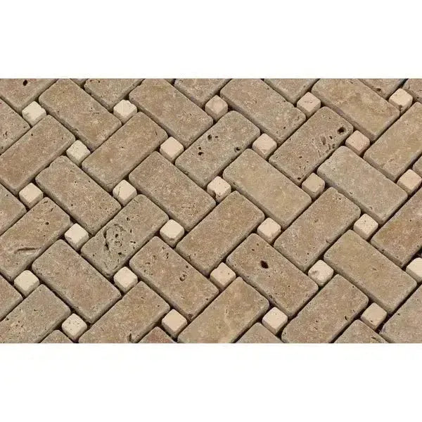 Herringbone pattern of tan and beige tiles in Noce Travertine Basketweave Mosaic