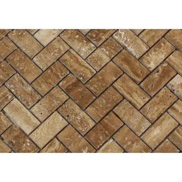 Herringbone pattern of brown and beige stone tiles in Noce Exotic Travertine Mosaic