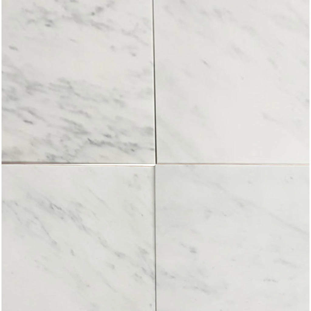 White marble tile pattern of Oriental White Asian Statuary 1/2X12 Pencil Liner