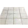 White marble-patterned floor tiles from Oriental White Asian Statuary Pencil Liner