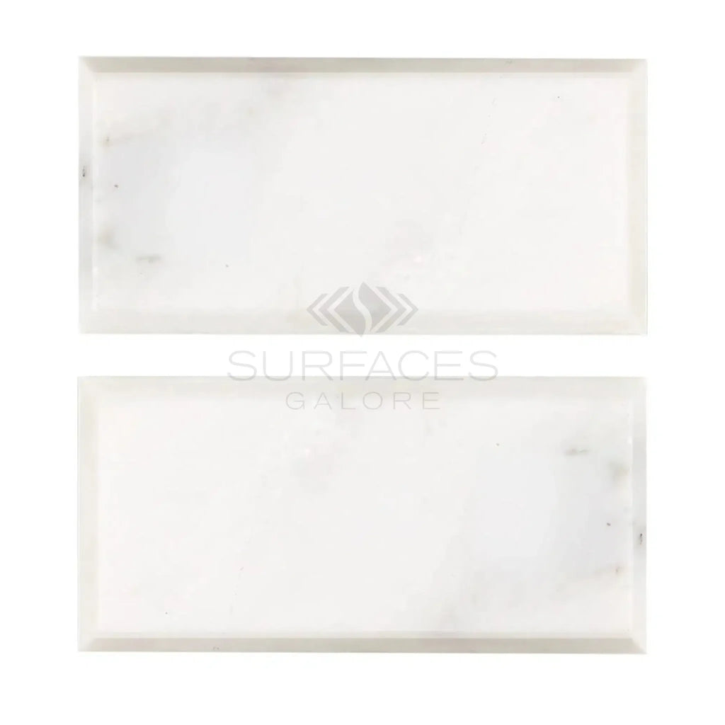 Two white marble tiles of Oriental White Asian Statuary Marble 3X6 Deep-Beveled