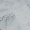 White marble floor tiles in Oriental White Asian Statuary Marble 6X12 polished finish