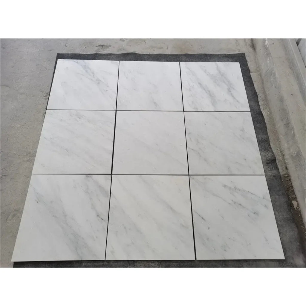 Nine white marble tiles from Oriental White / Asian Statuary Octagon Mosaic
