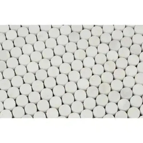 White circular mosaic tiles from Oriental White Asian Statuary marble collection