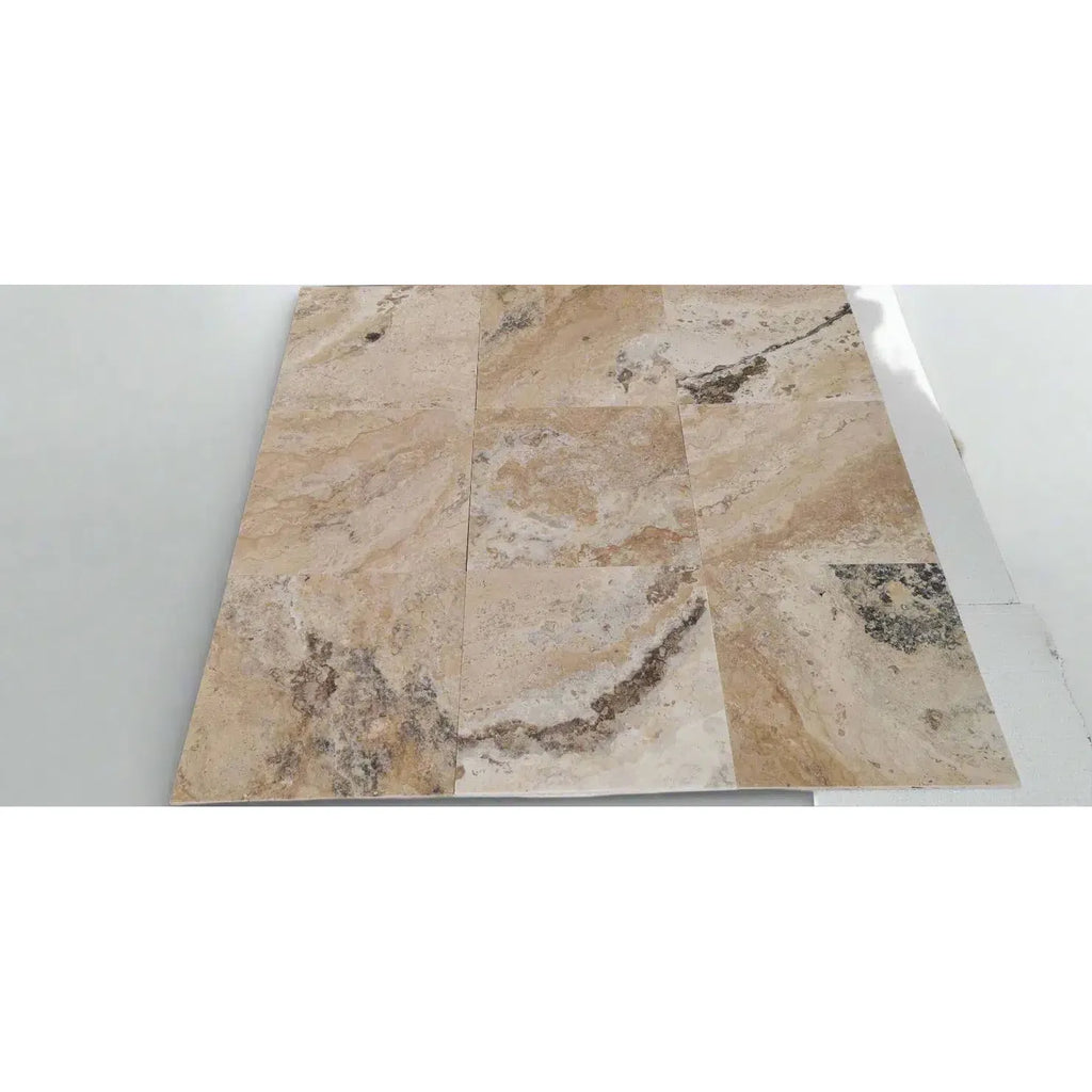 Beige and brown travertine tile arrangement of Philadelphia Travertine 18X18 Filled and Honed