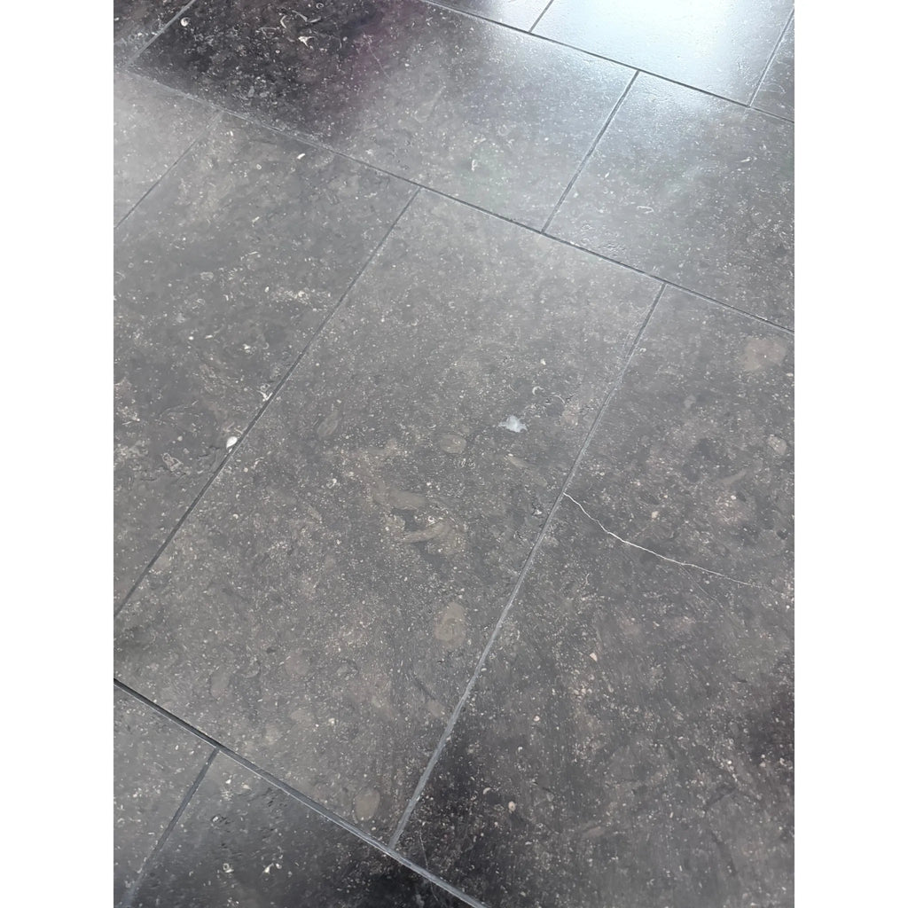 Gray tiled floor featuring Pierre Bleue 12X24 Brushed Marble for elegant interiors