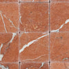 Rojo Alicante 3X3 Tumbled showcasing an elegant red marble tile pattern