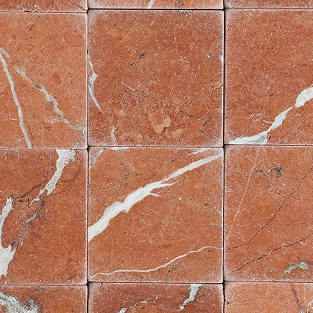 Rojo Alicante 3X3 Tumbled showcasing an elegant red marble tile pattern