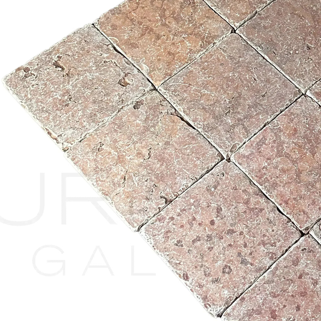 Rough-textured reddish-brown Rosso Verona Marble 6X6 Tumbled Tile displayed for sale