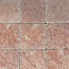 Reddish-brown square tiles from Rosso Verona Red Marble 6X6 Tumbled Tile collection