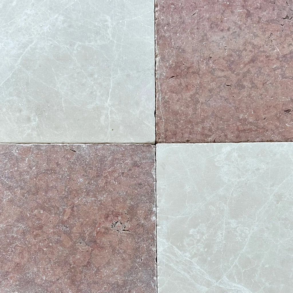 Four square Rosso Verona Marble 12X12 Tumbled tiles showcasing elegant design