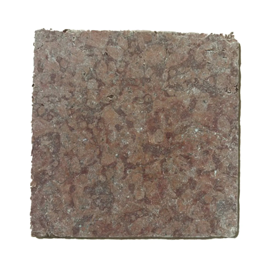 Square reddish-brown tumbled Rosso Verona Marble tile with a rough texture