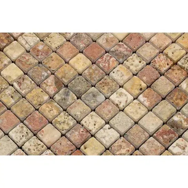 Diamond-patterned mosaic tile surface of Scabos Travertine 1X1 Mosaic Tumbled