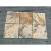 Six square Scabos Travertine 1X12 Rope Liner Honed stone tiles displayed together