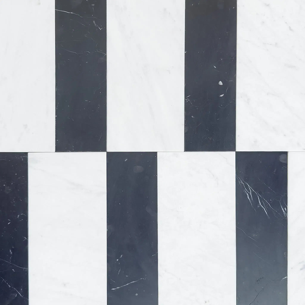 Black and white striped marble tiles in Siena Carrara White and Nero Marquina set