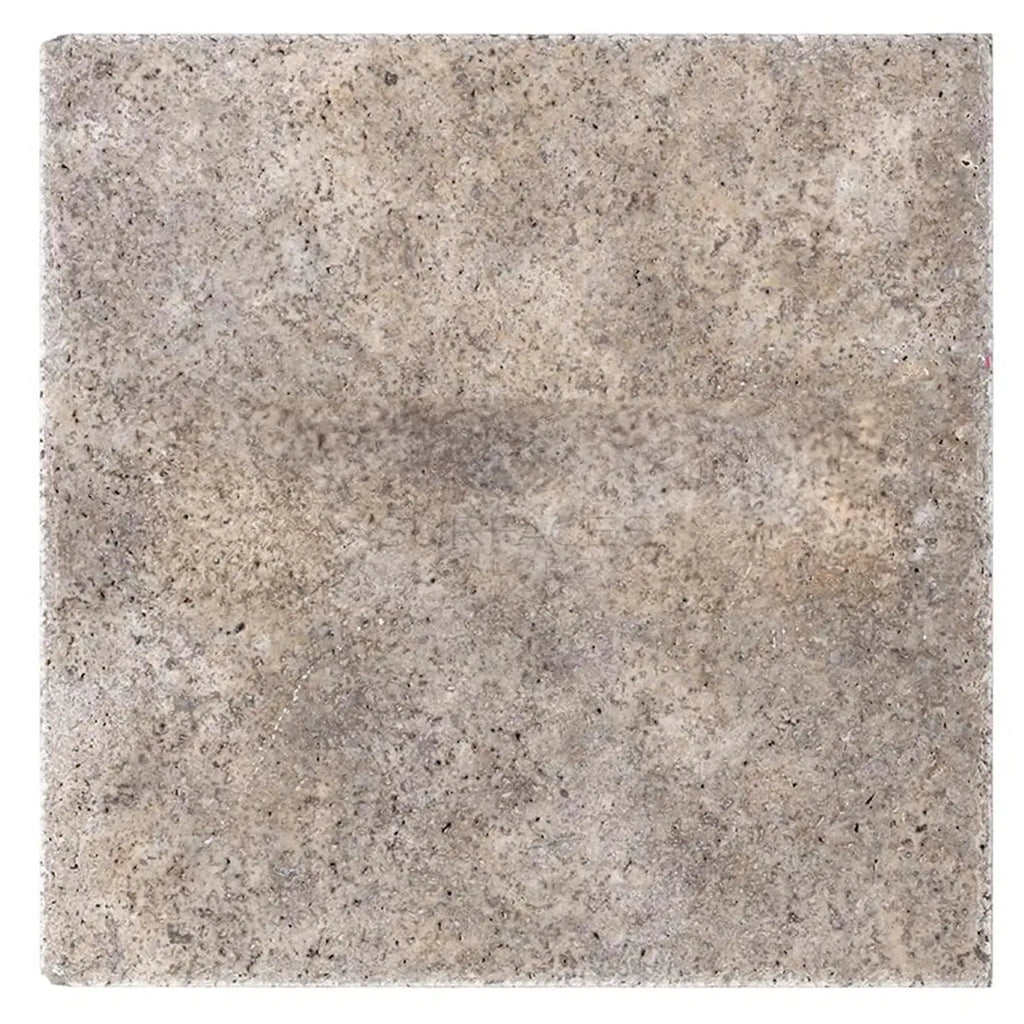 Square speckled gray tile from Silver Gray Travertine 16X16 brushed and chiseled edge