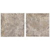 Two square mottled beige tiles of Silver Gray Travertine 18X18 Tile Filled and Honed