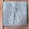 Gray stone tile with textured surface from Silver Travertine 18X18 Tile Filled and Honed