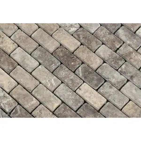 Rectangular gray brick pavers in Silver Travertine 1X2 Brick Mosaic Tumbled design