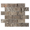 Textured gray stone brick wall showcasing Silver Travertine 2X4 Mosaic Tile