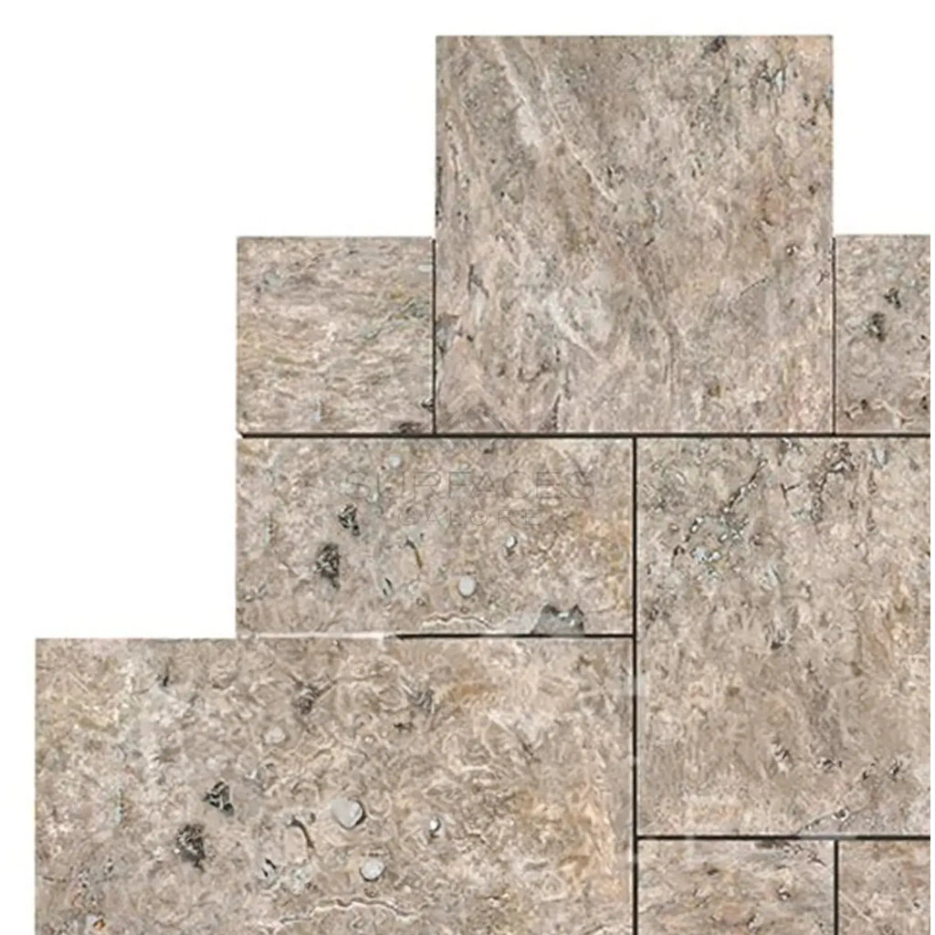 Gray stone tile arrangement of Silver Travertine in a Versailles Pattern set