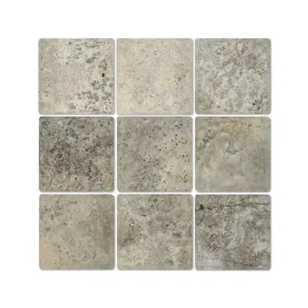 Nine square textured tiles of Silver Gray Travertine 6X6 Tumbled displayed together