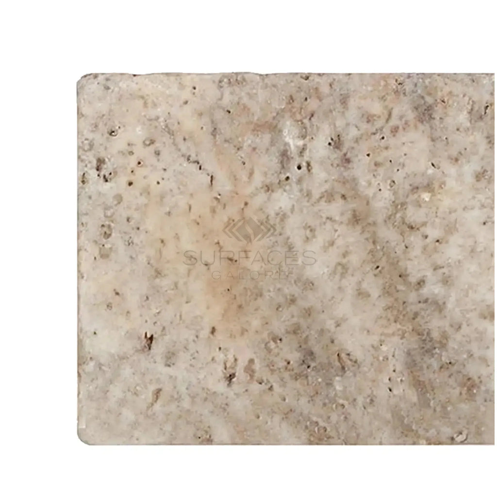 Beige travertine tile from the Silver Gray Travertine 8X16 Tumbled collection