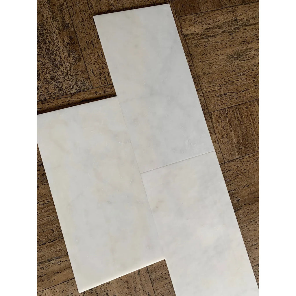 Snow White 1X2 Herringbone Marble Mosaic Polished featuring a white L-shaped tile design