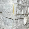 White stacked stone corner from Split-Face Panel Travertine Set on sale