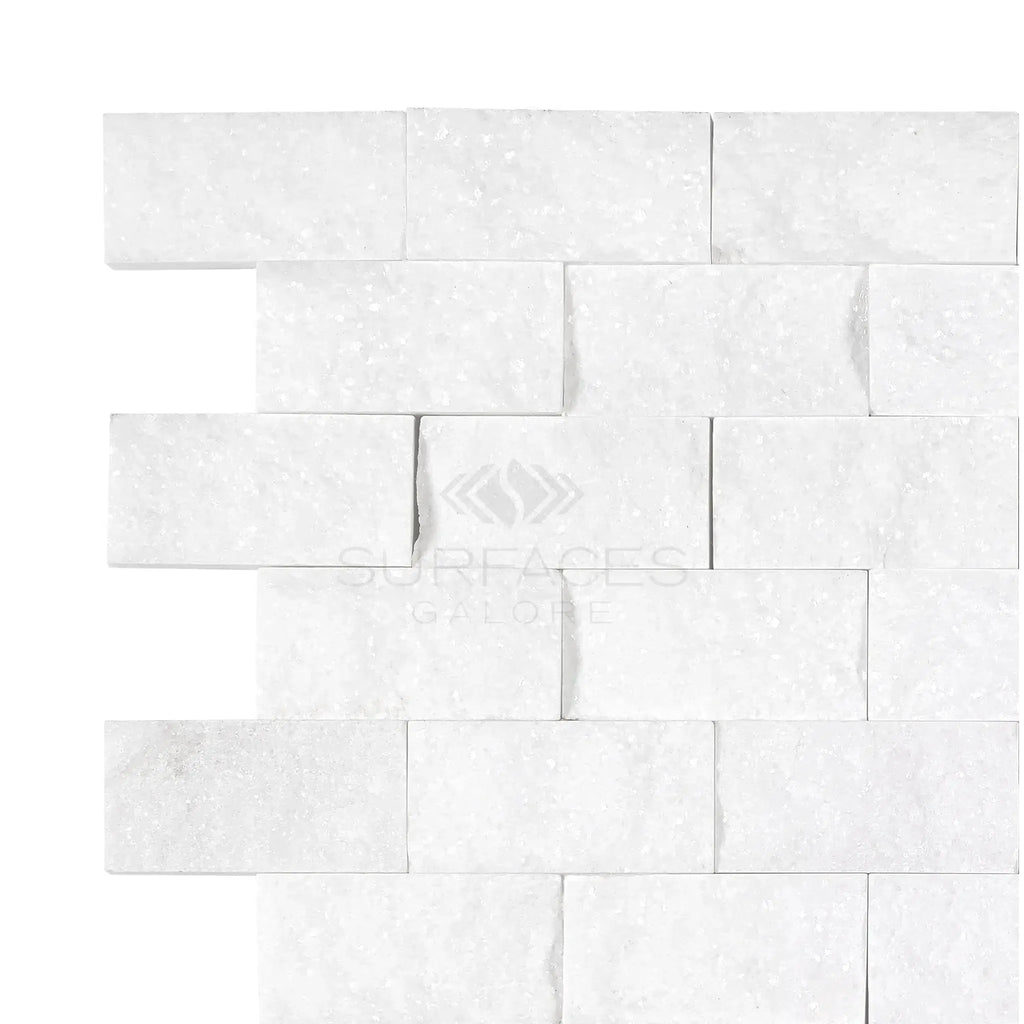 Thassos White 1X2 Brick Mosaic Marble Split-Faced displayed on a white brick wall tile