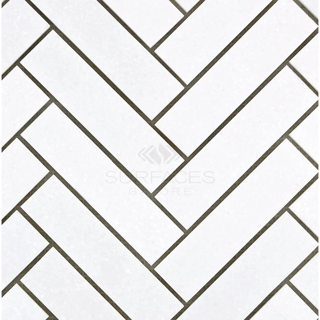 Thassos White 1X4 Herringbone Mosaic Marble in a polished and honed finish