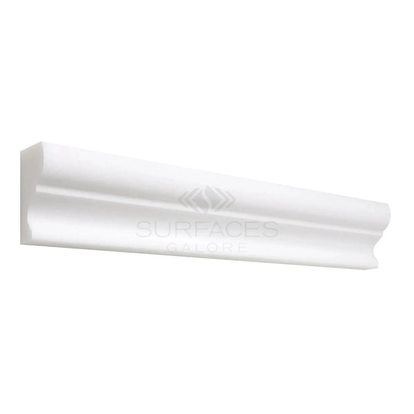 White decorative molding in Thassos White 2X12 Crown Mercer Molding Marble finish