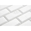 White beveled subway tiles in Thassos White 2X4 Deep-Beveled Brick Mosaic Marble