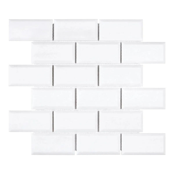 White beveled subway tile in Thassos White 2X4 Deep-Beveled Brick Mosaic Marble