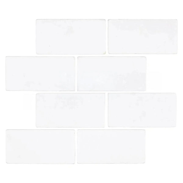 White rectangular tiles in Thassos White 3X6 Marble Tumbled for elegant decor