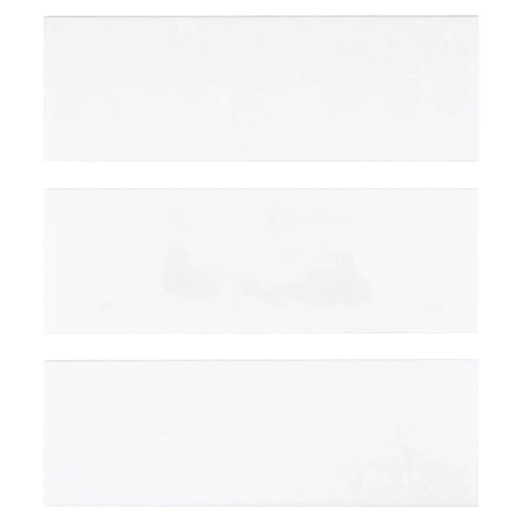 Three white rectangular panels of Thassos White 4X12 Deep-Beveled Marble