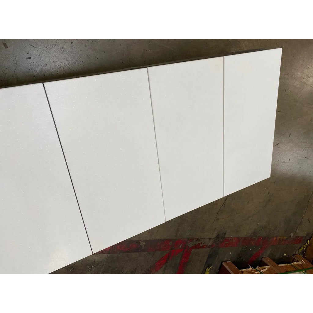 White rectangular panels on Thassos White Marble 4 Gang ROCKER Switch Wall Plate