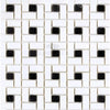 Black and white mosaic tile pattern in Thassos White Pinwheel Marble design