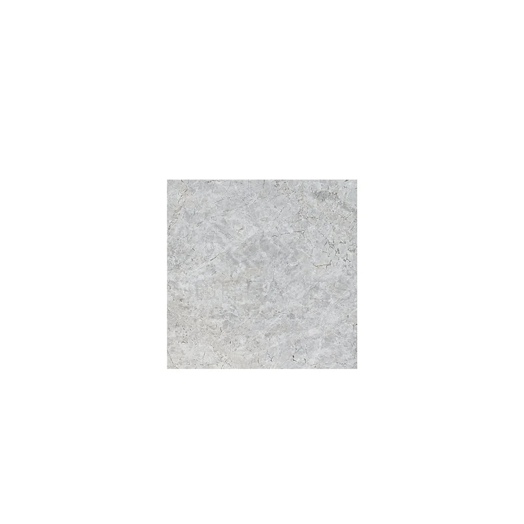 Gray mottled square tile showcasing Tundra Gray 12X12 Marble Polished or Honed finish