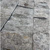 Gray stone wall tiles in Tundra Gray 2X4 Marble Mosaic Split-Faced design